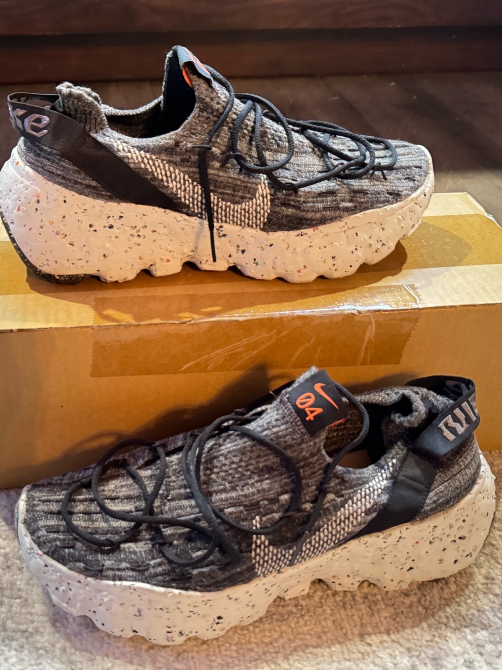 Nike Men’sBlack and White Space Hippie 04 Knit Sneakers with Orange Accents